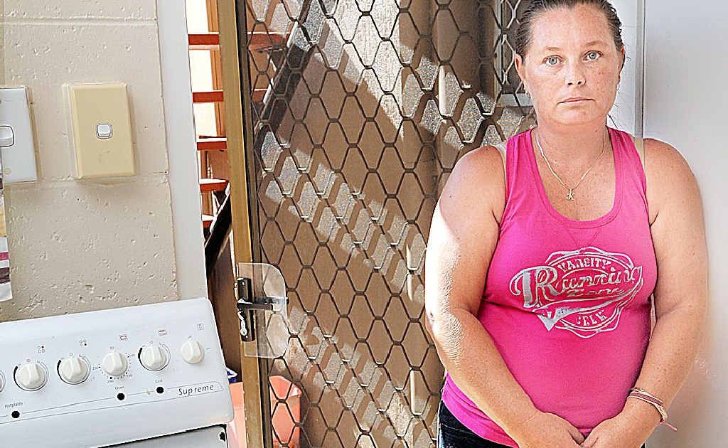 When Shannon Armstrong answered a late-night knock on her back door, a thief snuck in through the front door and stole her handbag. When Shannon Armstrong answered a late-night knock on her back door, a thief snuck in through the front door and stole her handbag.